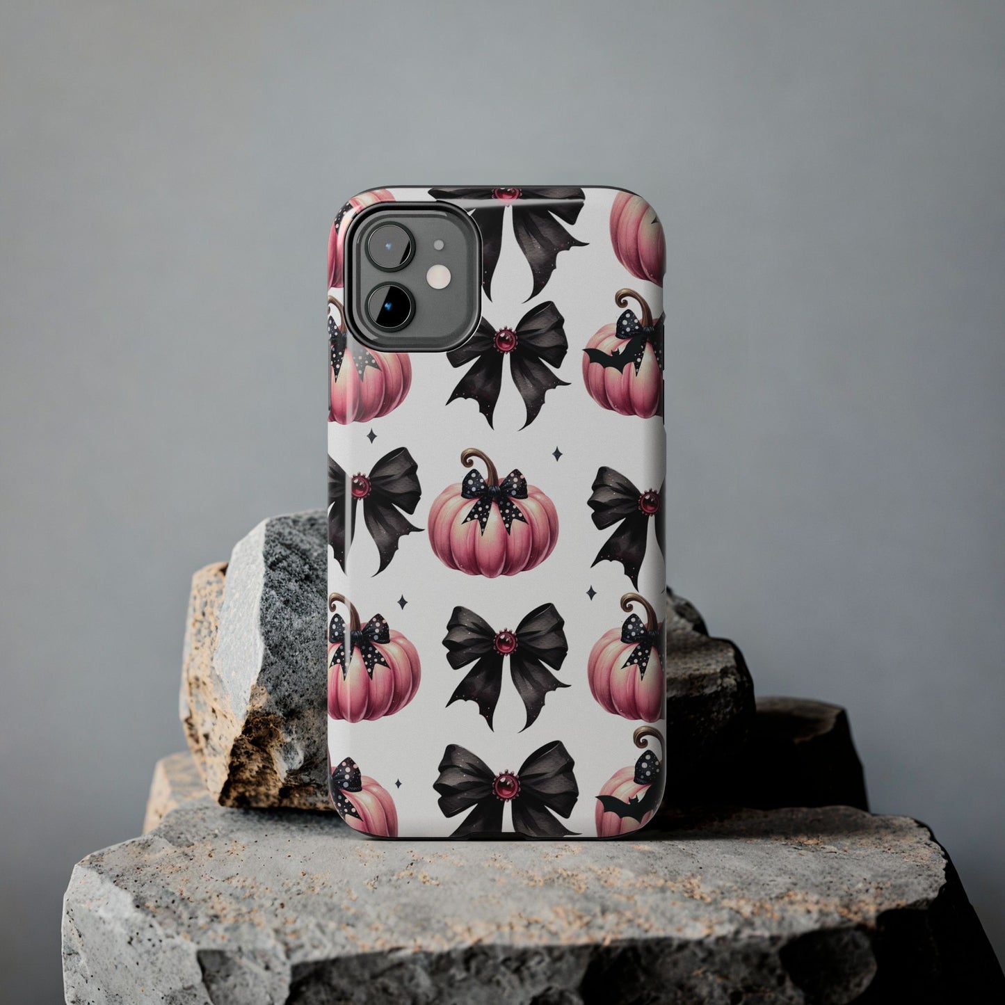 Custom pink & black Halloween bows personalized iPhone case. Compatible with iPhone models 11, 12, 13, 14, 15 including all mini, plus, pro & pro max