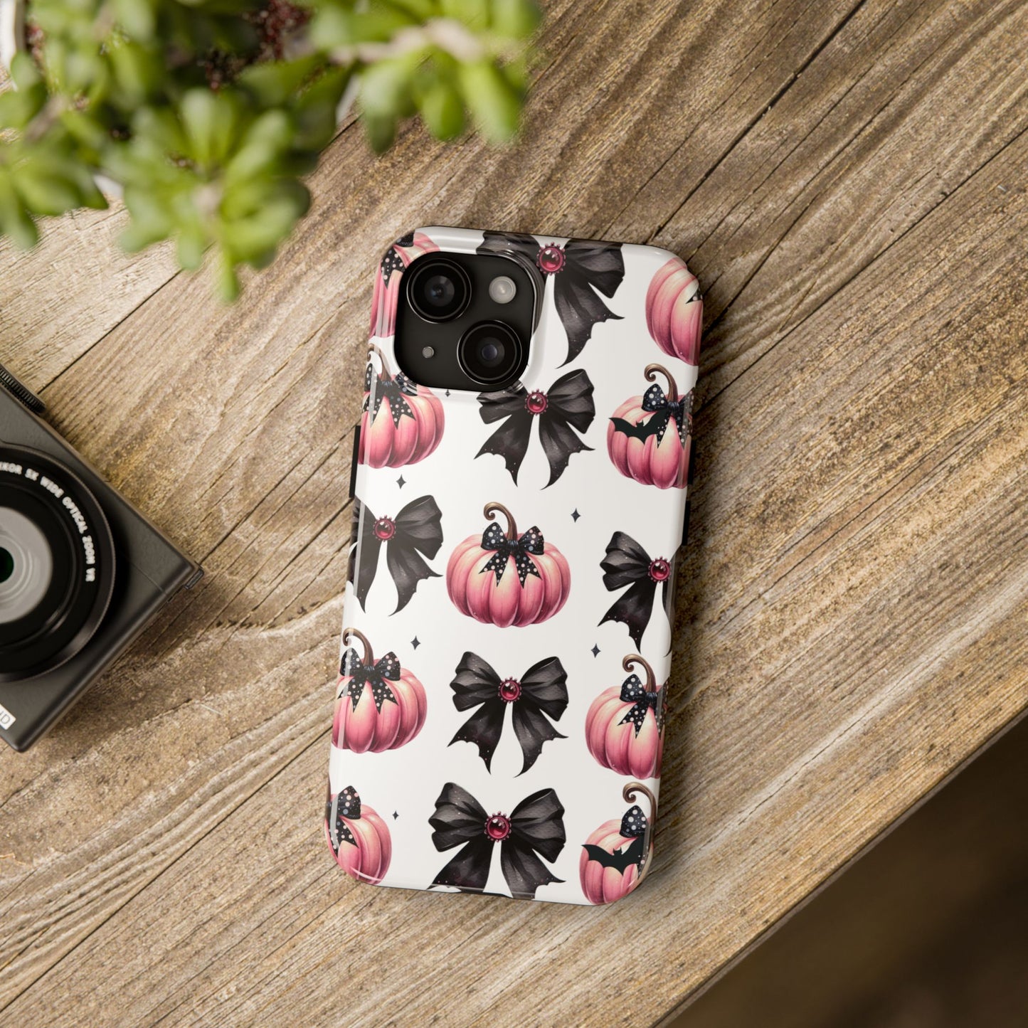 Custom pink & black Halloween bows personalized iPhone case. Compatible with iPhone models 11, 12, 13, 14, 15 including all mini, plus, pro & pro max